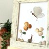 A lovely scene with a butterfly, snail, and flowers, made with seaglass and seashells, perfect as a unique gift! - Image 7