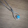 Silver turquoise drop pendant in silver square chain