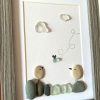 Seaglass Artwork with Birds and Clouds