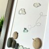Seaglass Artwork with Birds and Clouds