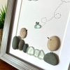 Seaglass Artwork with Birds and Clouds