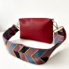 red-messenger-bag-with-chevrons-strap front
