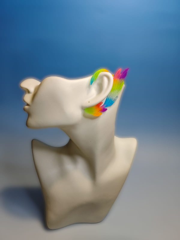 Rainbow colored fairy ear design on a mannequin