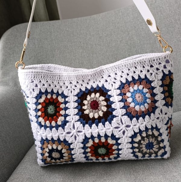 White granny square crochet bag with magnetic closure and felt lining